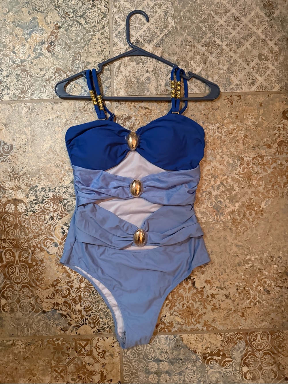 Blue Ruched One-Piece Swimsuit with Gold Accents